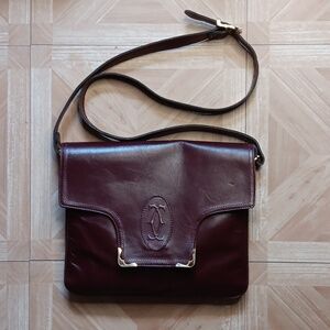 Vintage Cartier burgundy leather cross body bag